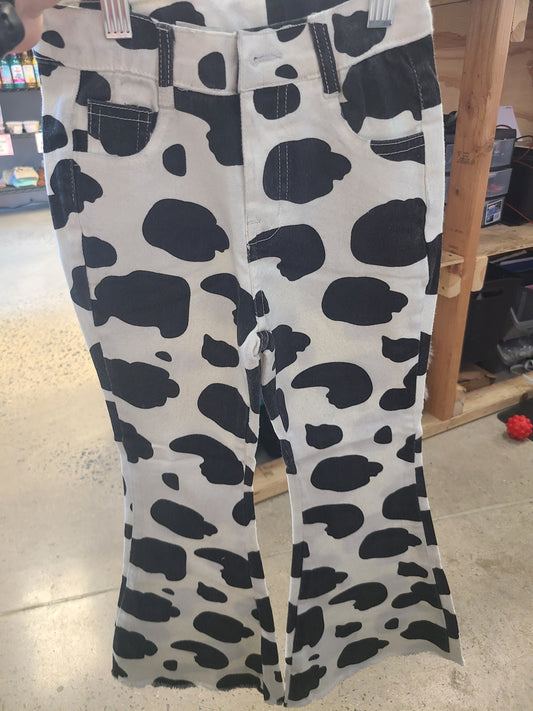 Cow print bell bottoms