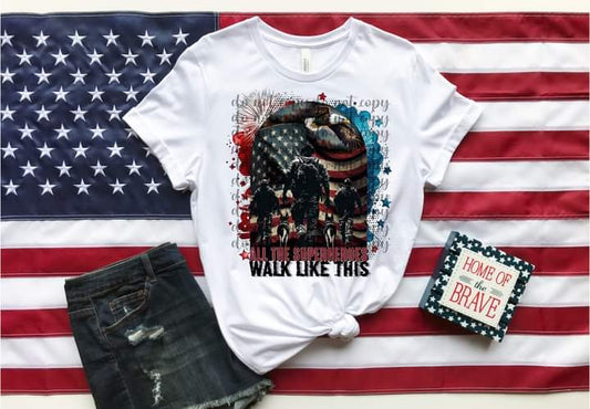 All The Superheroes Walk Like This Tee